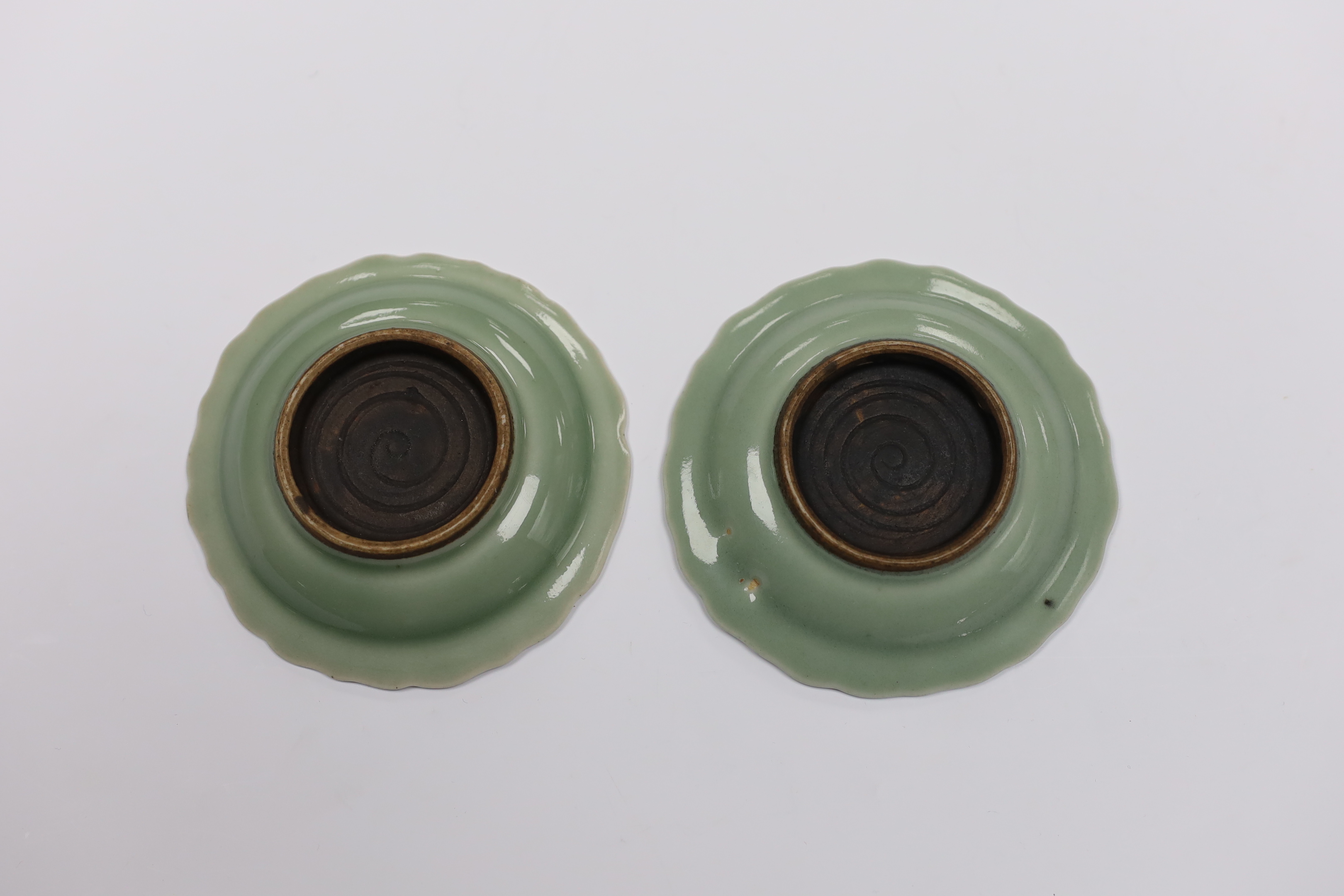 A pair of Japanese celadon dishes, 11.5cm diameter